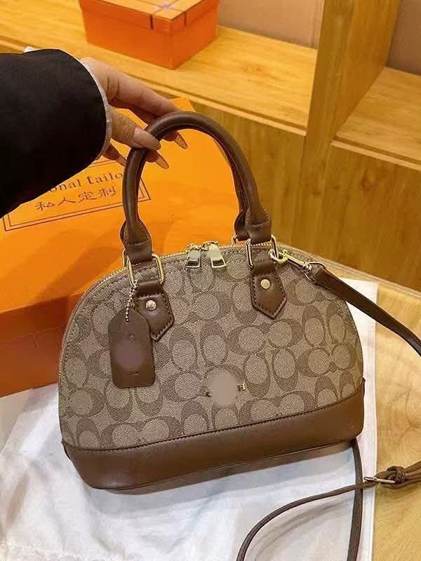 Coach clam bag