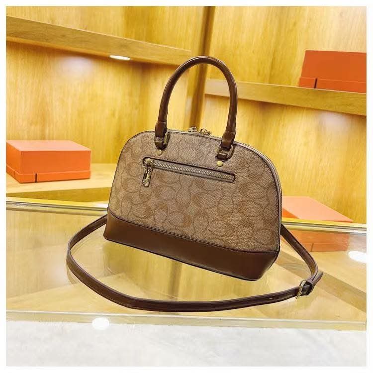 Coach clam bag