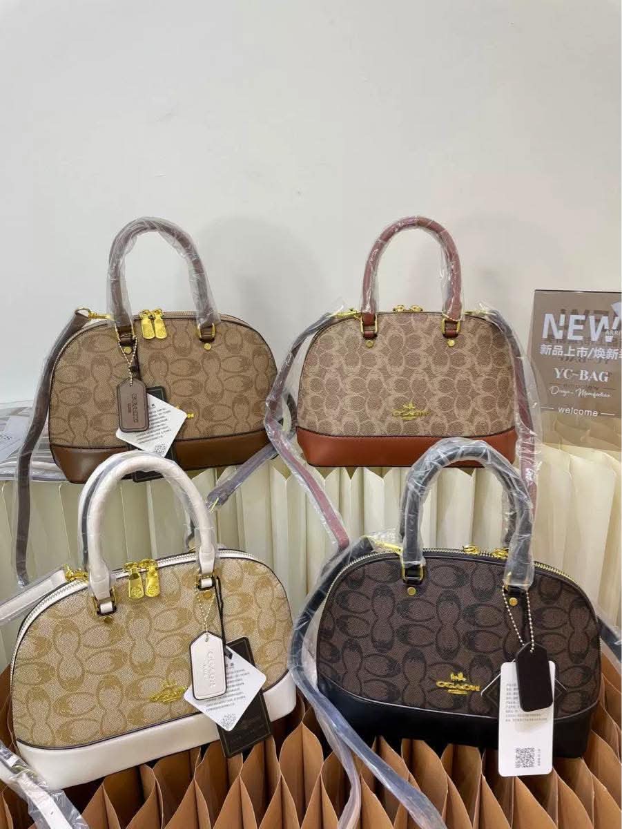 Coach clam bag