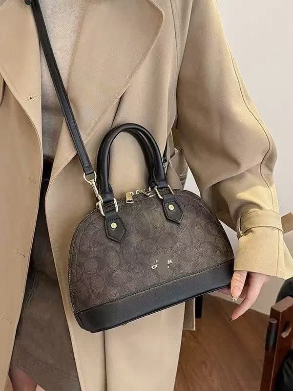Coach clam bag